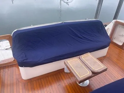 Slide: The Image of Covered seating area on 2005 Tiara Yachts 4400 Sovran with wooden deck. - 46