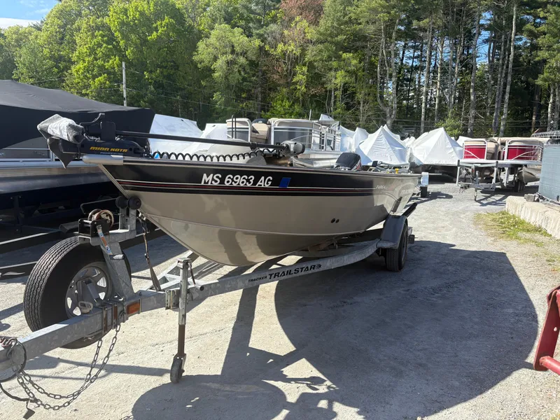 Slide: The Image of 2003 Tracker Targa 17 SC boat on trailer in outdoor storage area. - 10
