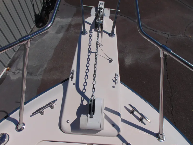 Slide: The Image of Bow of 2002 Grady-White 30 Marlin WA with anchor chain and railings. - 14