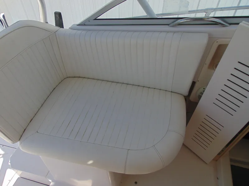 Slide: The Image of White cushioned seating on 2002 Grady-White 30 Marlin WA boat. - 19