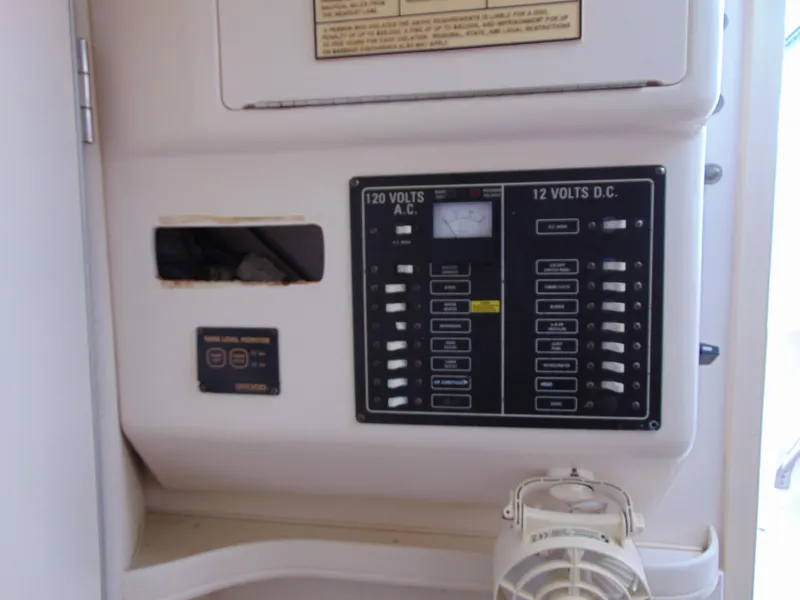 Slide: The Image of Electrical panel on a 2002 Grady-White 30 Marlin WA boat. - 27