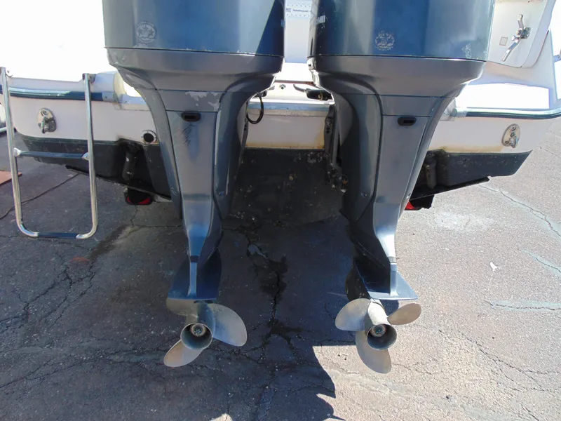 Slide: The Image of Twin outboard motors on a 2002 Grady-White 30 Marlin WA boat. - 5