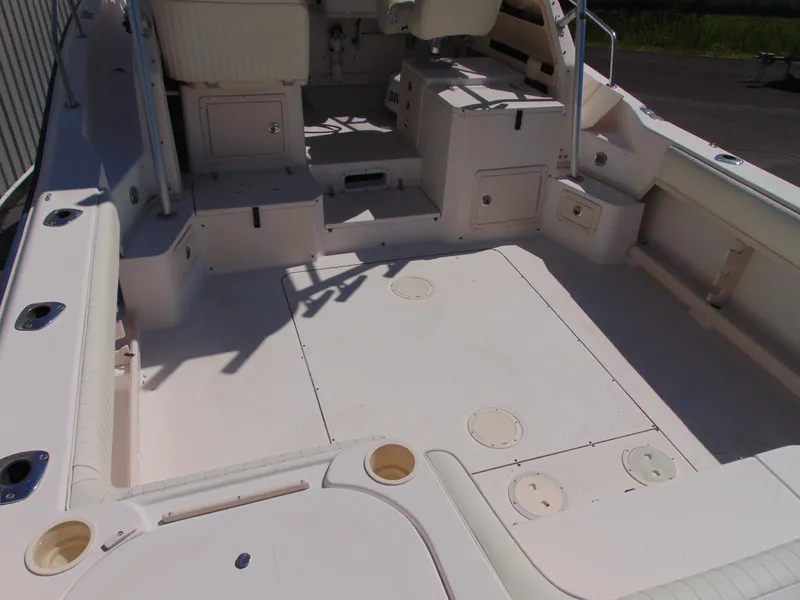 Slide: The Image of 2002 Grady-White 30 Marlin WA boat deck, spacious and well-equipped for fishing. - 7