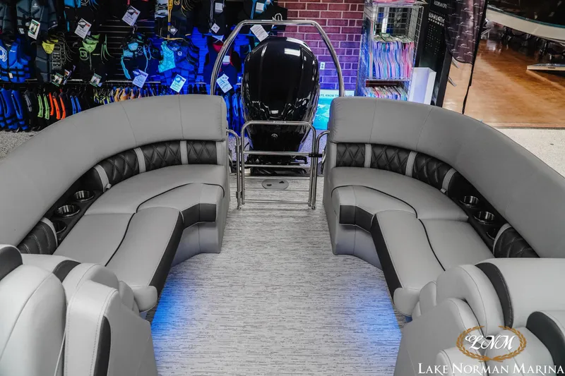 Slide: The Image of 2025 Bennington 24LXSFB pontoon boat interior with luxurious seating and modern design at Lake Norman Marina. - 16