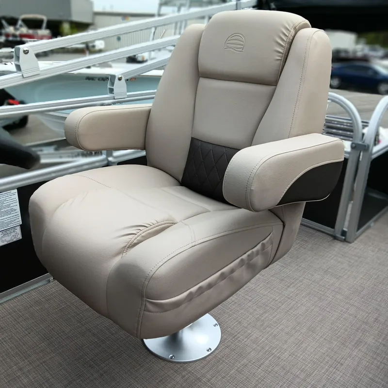 Slide: The Image of Luxurious captain's chair on 2025 Sun Tracker Party Barge 18 DLX pontoon boat. - 9