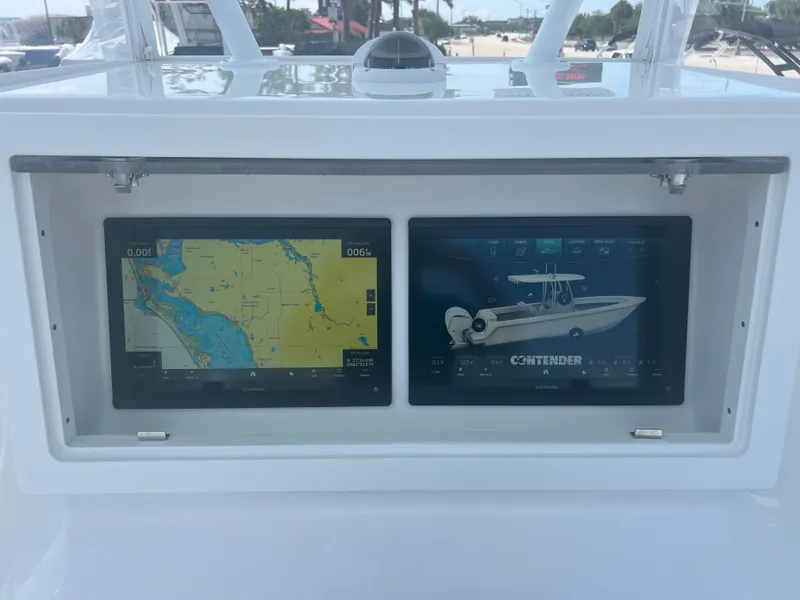 Slide: The Image of Dashboard of 2025 Contender 30 ST boat with navigation and system displays. - 12