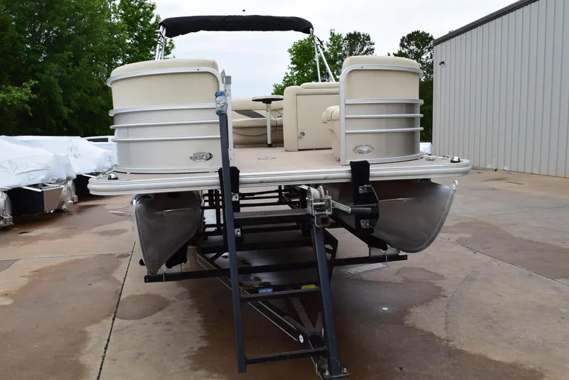 Slide: The Image of 2014 SunChaser Classic Cruise 8520 pontoon boat on trailer, parked outdoors. - 5