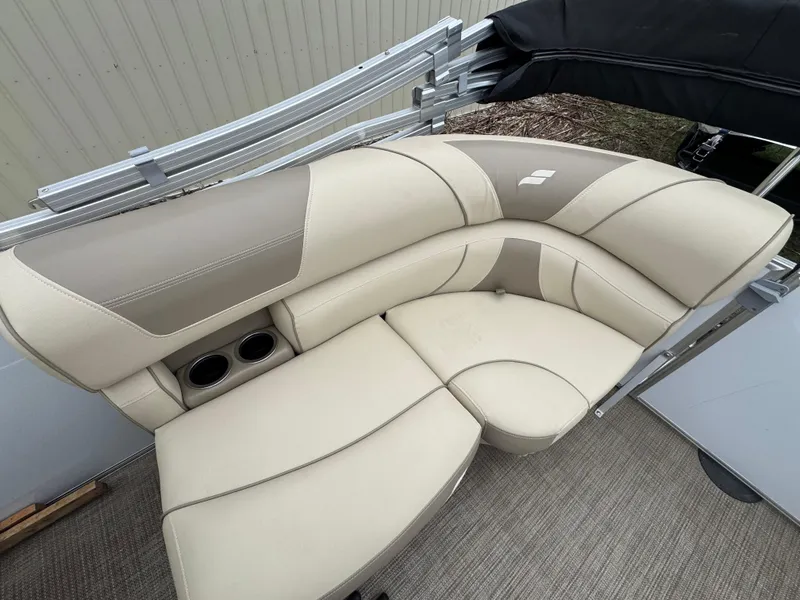 Slide: The Image of Luxurious beige seating on 2019 Starcraft EX 20 R boat with cup holders. - 6