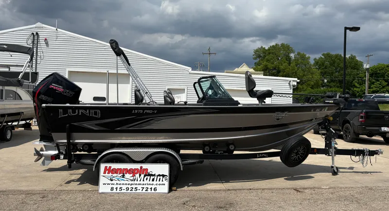 Slide: The Image of 2021 Lund 1975 Pro-V boat on trailer at Hennepin Marine dealership. - 0