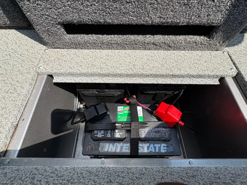 Slide: The Image of Battery compartment of 2021 Lund 1975 Pro-V boat with Interstate battery. - 11
