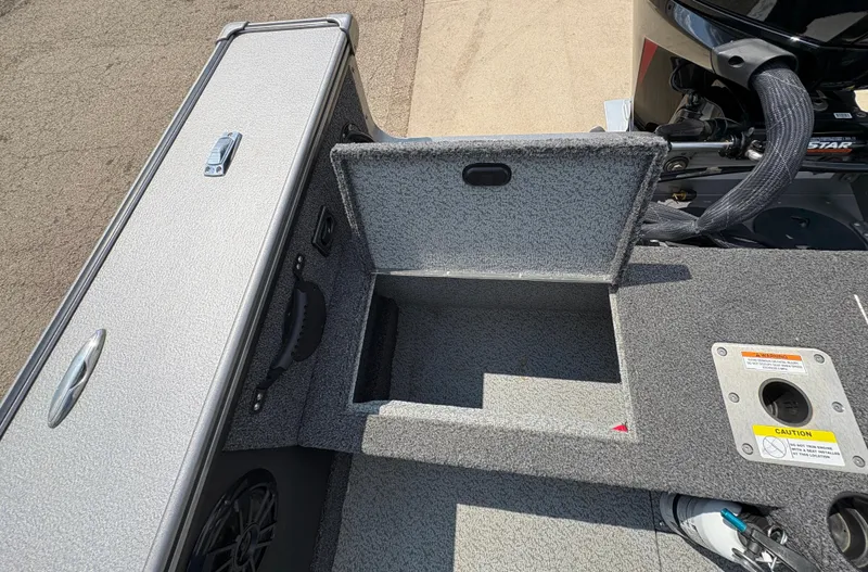 Slide: The Image of Open storage compartment on a 2021 Lund 1975 Pro-V boat. - 25
