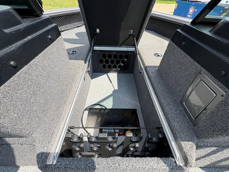 Slide: The Image of Interior view of a 2021 Lund 1975 Pro-V boat storage compartment. - 30