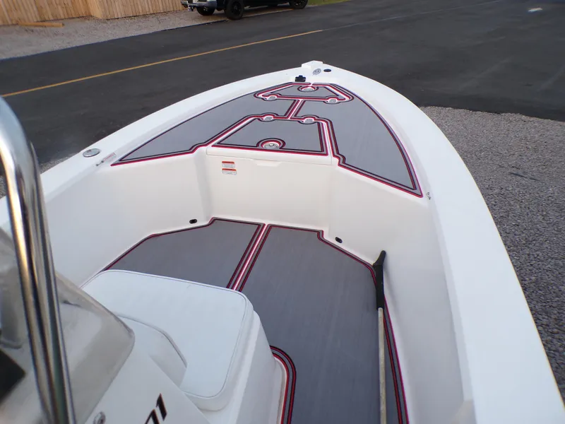 Slide: The Image of 2006 Mako 1801 Inshore boat deck with custom non-slip flooring. - 12
