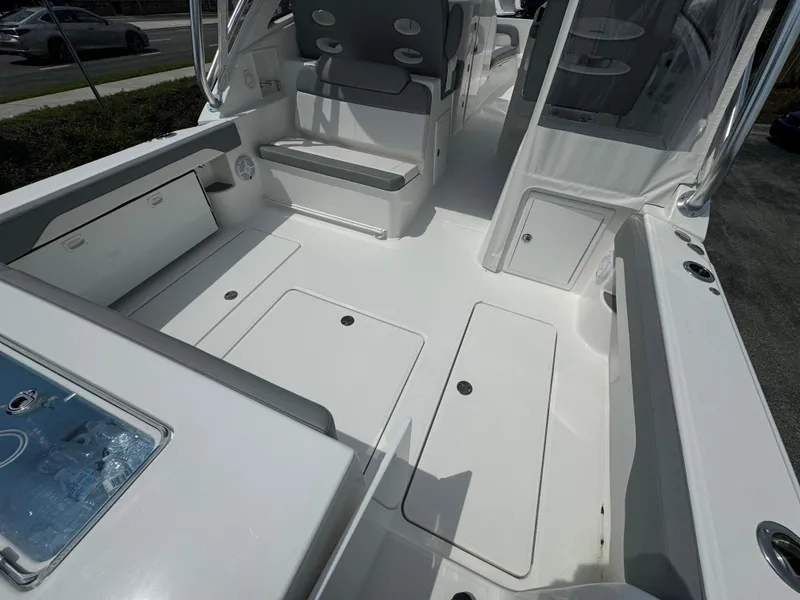Slide: The Image of 2025 Albemarle 31 Dual Console boat on green water, aerial view. - 5