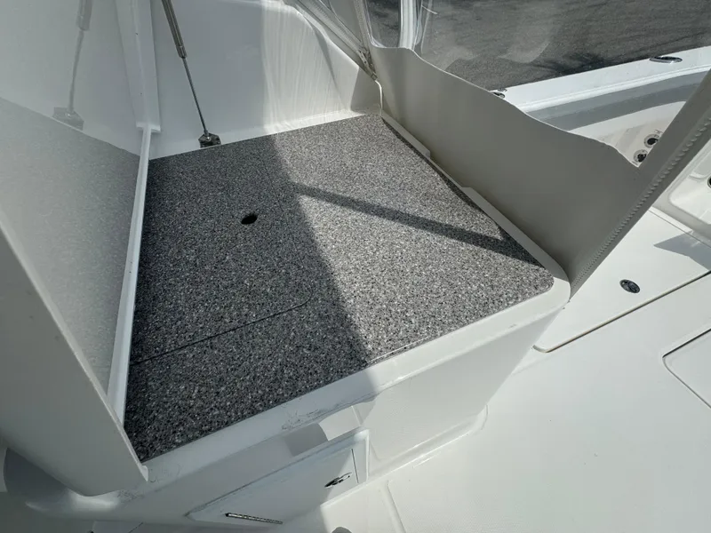 Slide: The Image of 2025 Albemarle 31 Dual Console boat cruising on open water with triple Yamaha engines. - 8