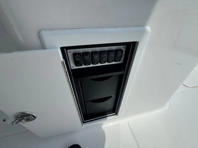 Slide: The Image of 2025 Albemarle 31 Dual Console boat on trailer at Bellhart Marine dealership. - 9