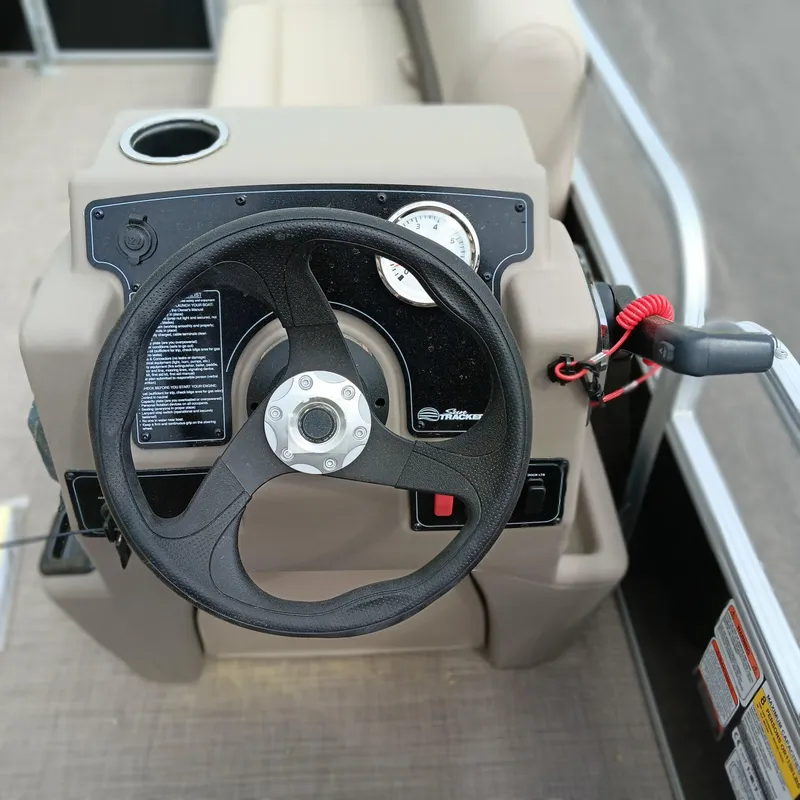 Slide: The Image of Steering console of 2025 Sun Tracker Party Barge 16 DLX pontoon boat. - 7