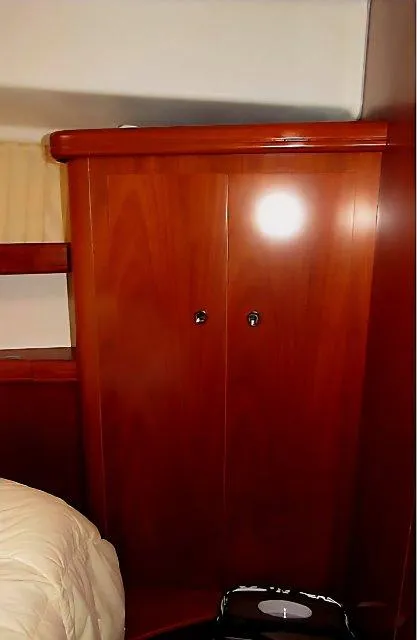 Slide: The Image of Wooden cabinet in 2006 Beneteau Swift Trawler 42 interior. - 39