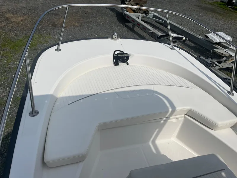 Slide: The Image of 2008 Boston Whaler 170 Montauk boat deck with seating and railing. - 10