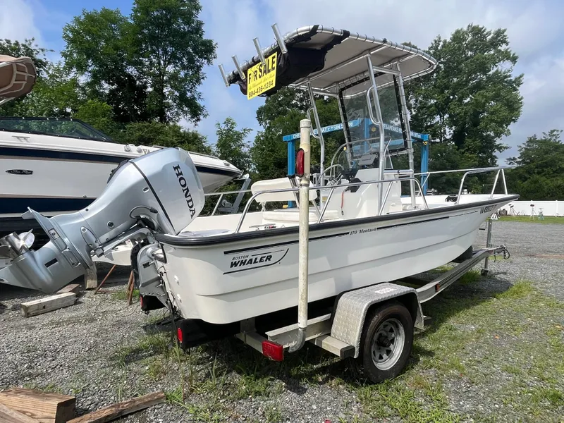 Slide: The Image of 2008 Boston Whaler 170 Montauk boat with Honda motor, for sale on trailer. - 21