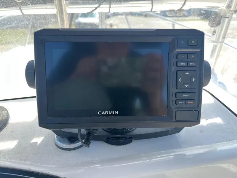 Slide: The Image of Garmin GPS device on 2008 Boston Whaler 170 Montauk boat dashboard. - 7