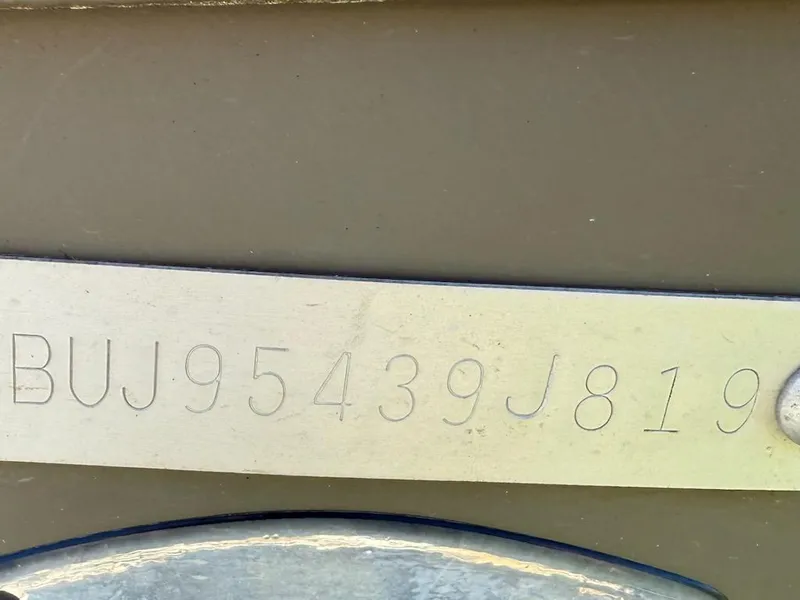 Slide: The Image of 2019 Tracker Grizzly Tracker 1648 MVX hull identification number plate. - 11