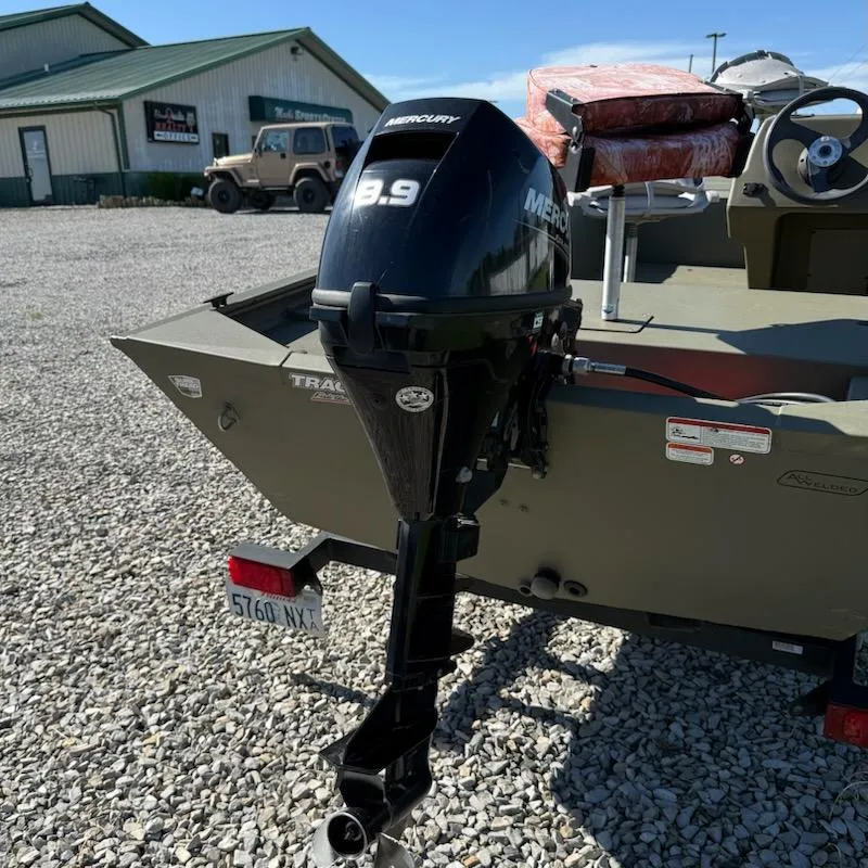 Slide: The Image of 2019 Tracker Grizzly Tracker 1648 MVX boat with Mercury 9.9 outboard motor. - 6