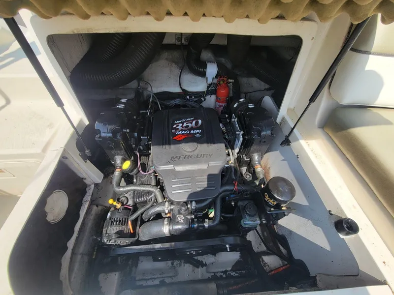 Slide: The Image of Engine compartment of a 2006 Sea Ray 220 Sundeck with MerCruiser 350 MAG MPI. - 16