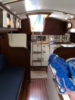 Slide: The Image of Interior of 1981 Cape Dory 33 Sloop, featuring cozy cabin and nautical decor. - 20