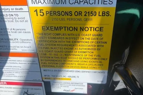 Slide: The Image of 2024 ATX Surf Boats 22 Type-S capacity label, 15 persons or 2150 lbs, exemption notice. - 10