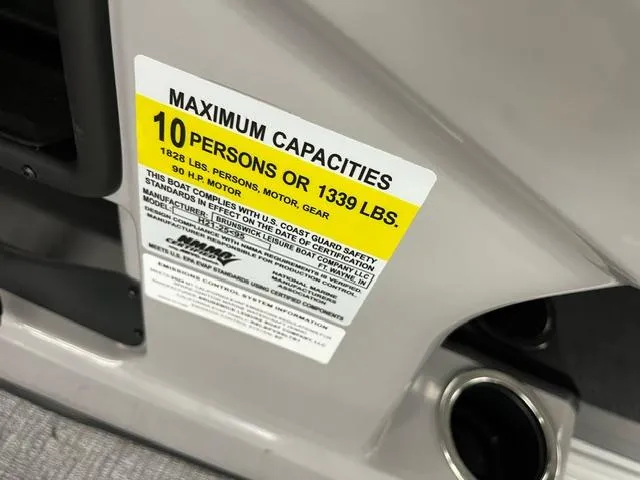 Slide: The Image of 2024 Harris Cruiser 210 capacity label, maximum 10 persons or 1339 lbs. - 17