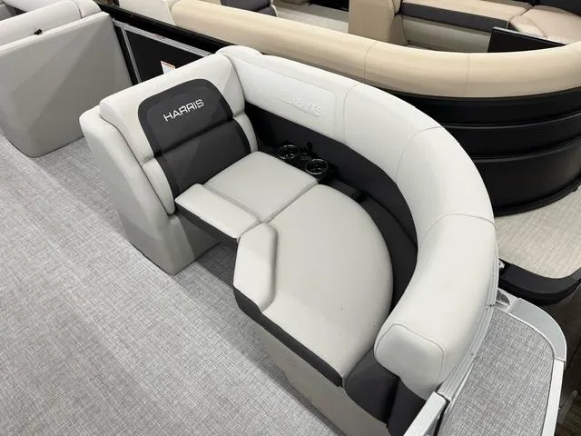 Slide: The Image of 2024 Harris Cruiser 210 boat seating with cup holders, featuring modern design and comfort. - 3