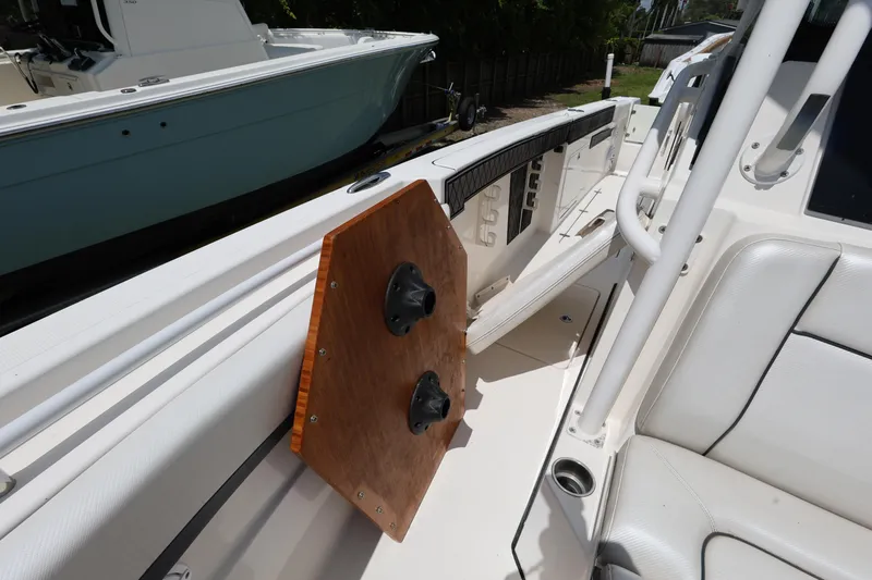 Slide: The Image of 2017 Wellcraft Scarab 302 Fisherman boat interior with seating and mounted equipment. - 21