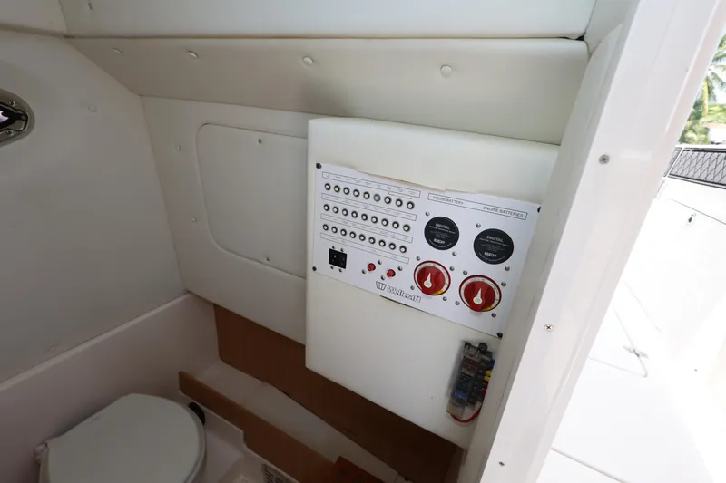 Slide: The Image of Control panel inside 2017 Wellcraft Scarab 302 Fisherman boat cabin. - 24