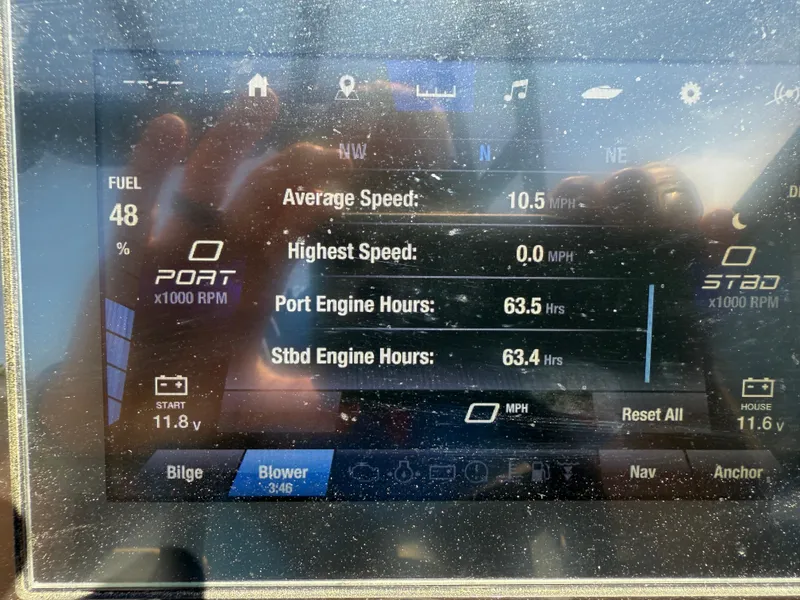 Slide: The Image of Dashboard of 2022 Yamaha Boats AR250 showing fuel, speed, and engine hours. - 18