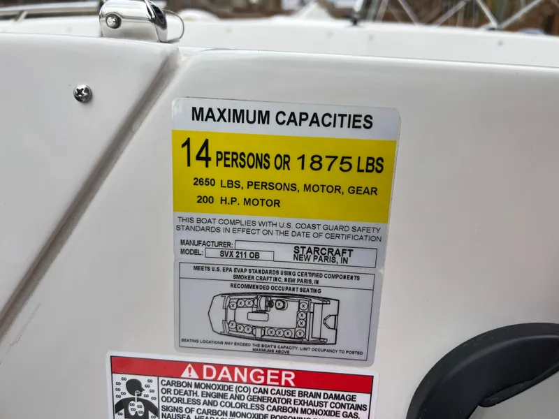 Slide: The Image of 2025 Starcraft SVX 211 OB capacity label: 14 persons or 1875 lbs, 200 HP motor. - 10