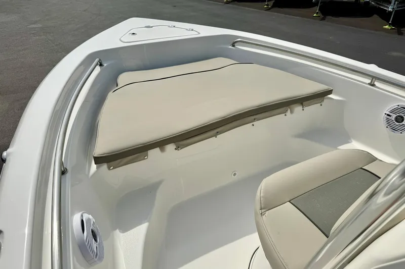 Slide: The Image of 2025 Key West 189 FS boat interior with cushioned seating and speakers. - 12