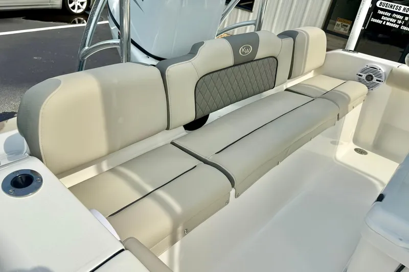 Slide: The Image of 2025 Key West 189 FS boat interior with beige seating and modern design. - 30