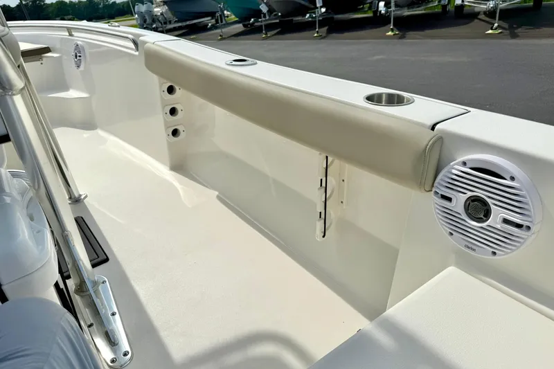 Slide: The Image of 2025 Key West 189 FS boat interior with cushioned seating and speaker system. - 34
