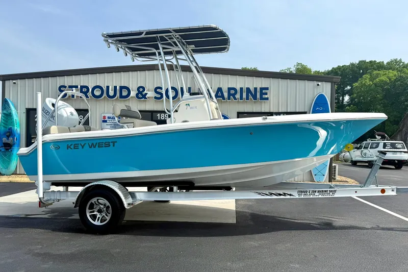 Slide: The Image of 2025 Key West 189 FS boat on trailer at Stroud & Son Marine dealership. - 6