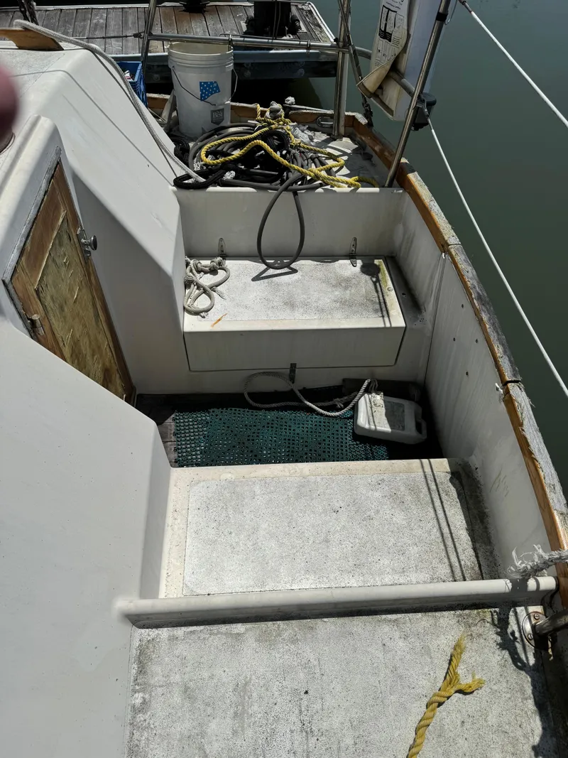 Slide: The Image of 1980 Cooper Marine Mapleleaf 48 boat deck with ropes and equipment. - 7