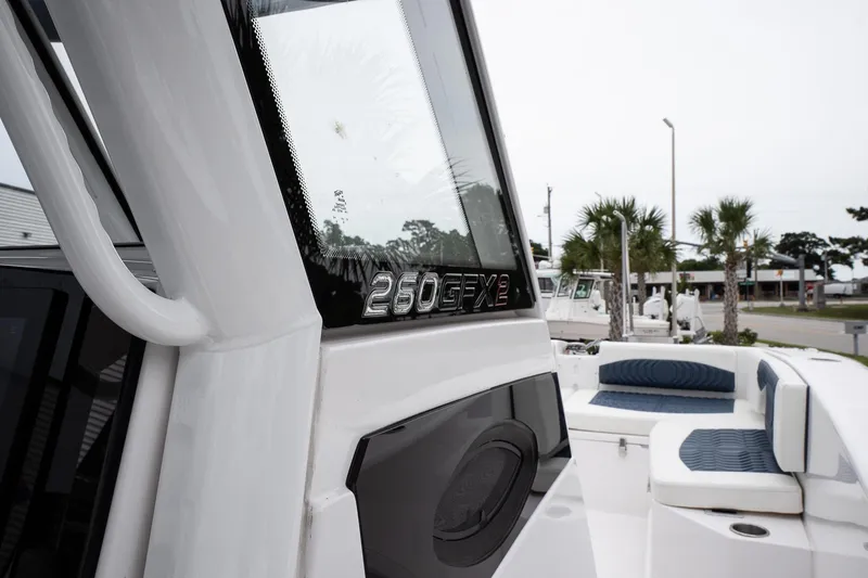 Slide: The Image of 2025 Twin Vee 260 GFX2 CC boat with sleek design and comfortable seating. - 19