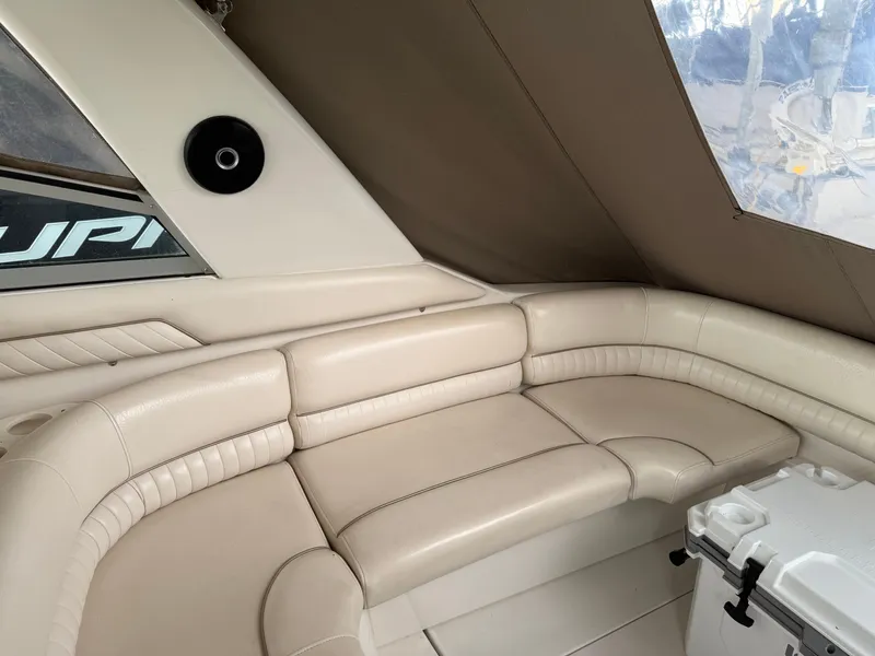 Slide: The Image of Luxurious interior seating of a 2001 Monterey 322 Cruiser with beige upholstery. - 11