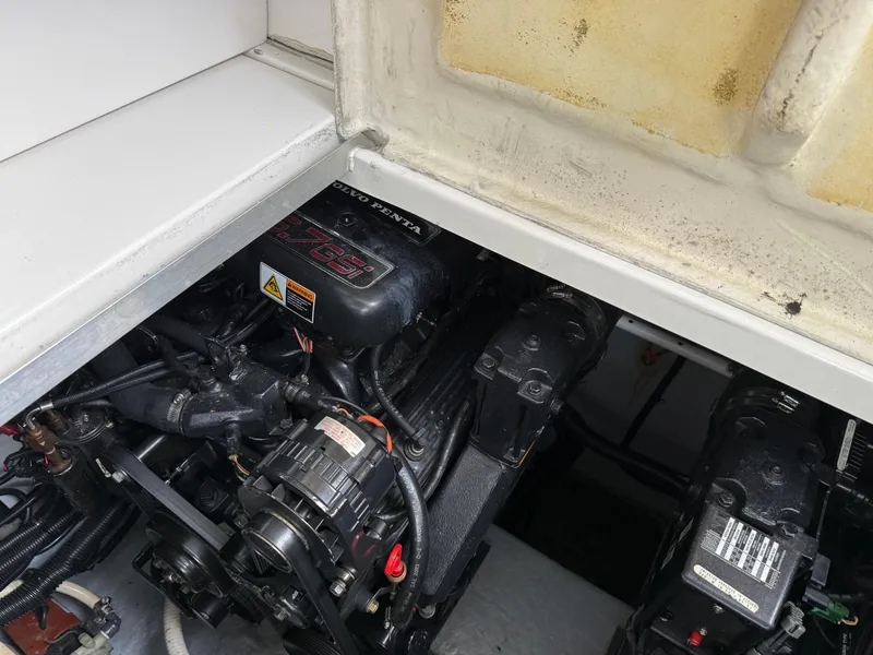 Slide: The Image of Engine compartment of a 2001 Monterey 322 Cruiser boat, showcasing mechanical components. - 29