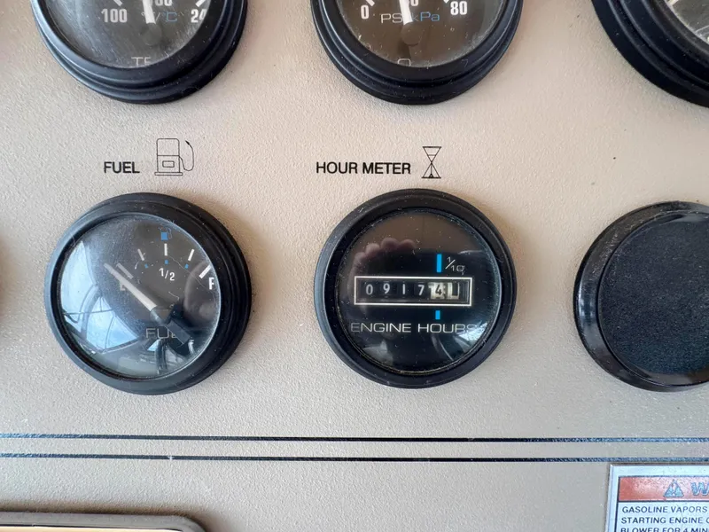 Slide: The Image of Close-up of 1999 Carver 406 Aft Cabin Motor Yacht fuel and engine hour meters. - 19