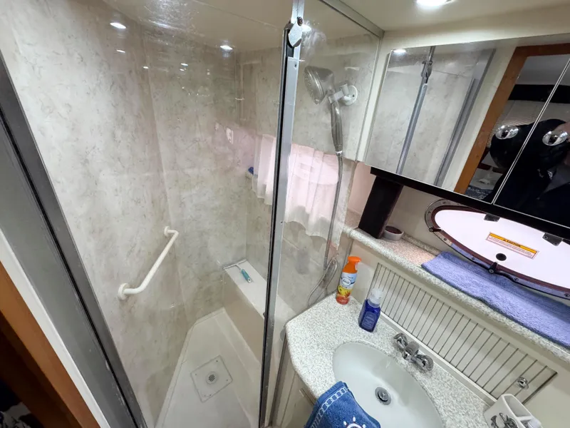 Slide: The Image of Bathroom in 1999 Carver 406 Aft Cabin Motor Yacht with shower and sink. - 39