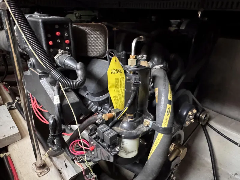 Slide: The Image of Engine compartment of a 1999 Carver 406 Aft Cabin Motor Yacht with Volvo Penta components. - 41