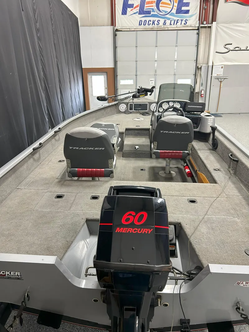 Slide: The Image of 2005 Tracker Targa 17 SC boat with Mercury 60 engine in a showroom. - 4