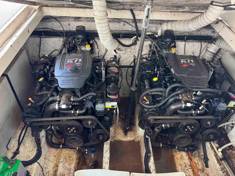 Slide: The Image of Engine compartment of a 2004 Rinker Fiesta Vee 290 with dual 5.0 MPI engines. - 29