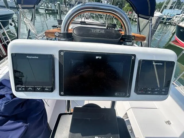 Slide: The Image of Control panel of a 2015 Catalina 315 sailboat with navigation displays. - 5